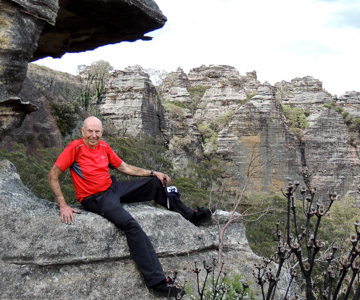 Michael Keats, a vivid contrast to Lost City in the background